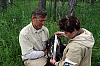 Dave and Irina measuring chick.jpg